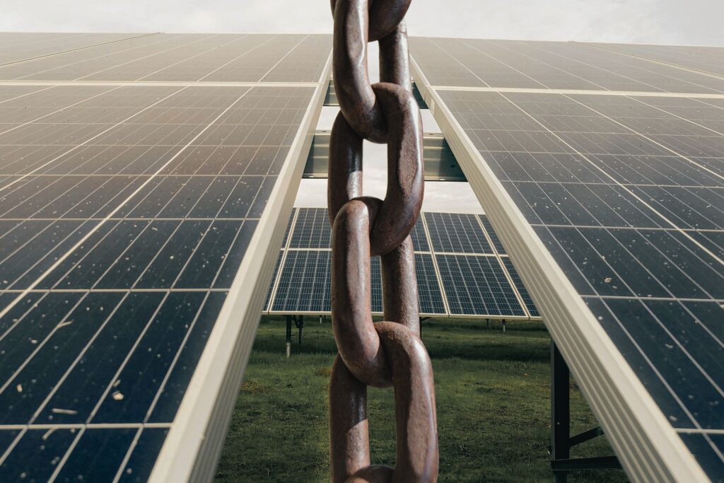 a chain in front of solar panels